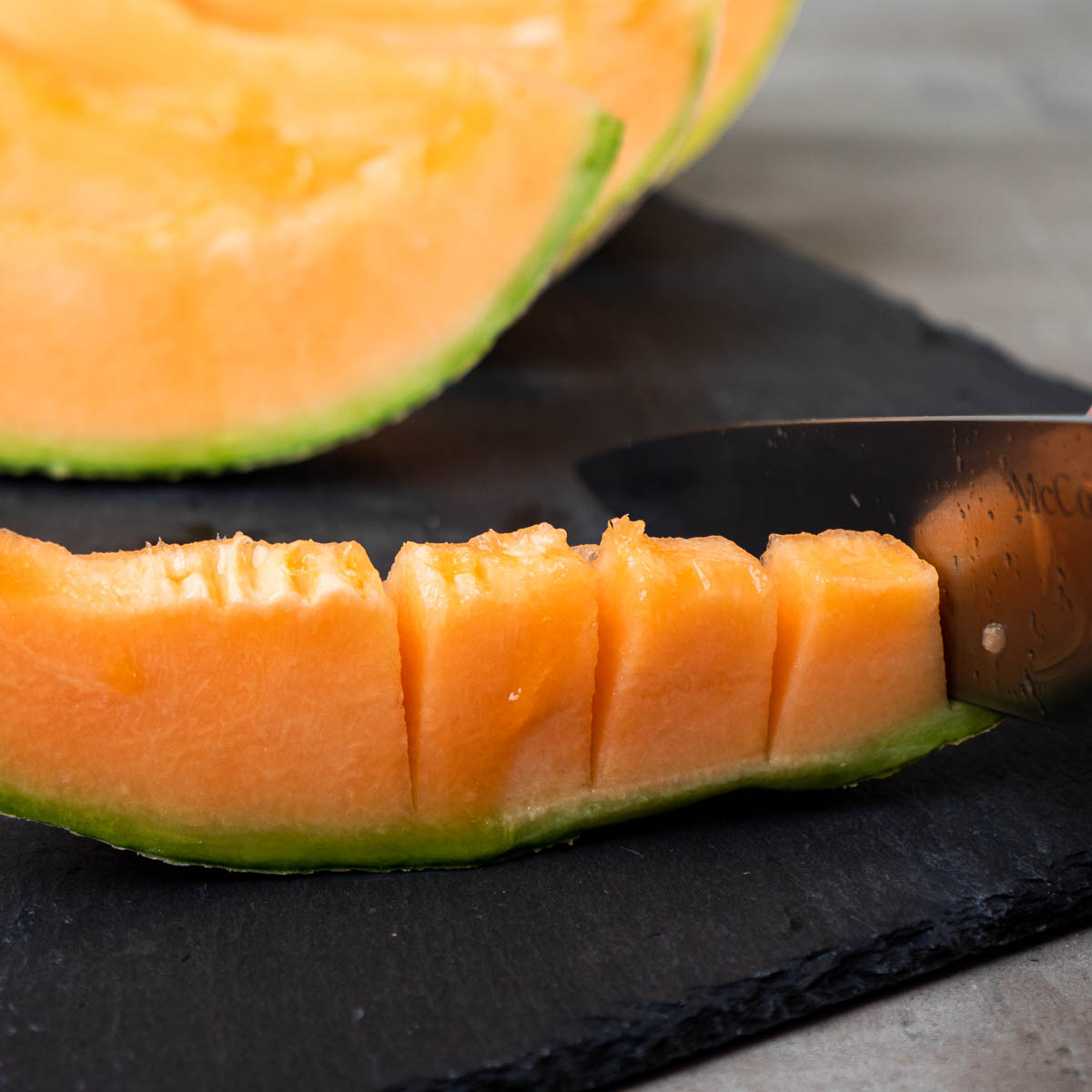 how to cut a cantaloupe steps: Slice into wedges