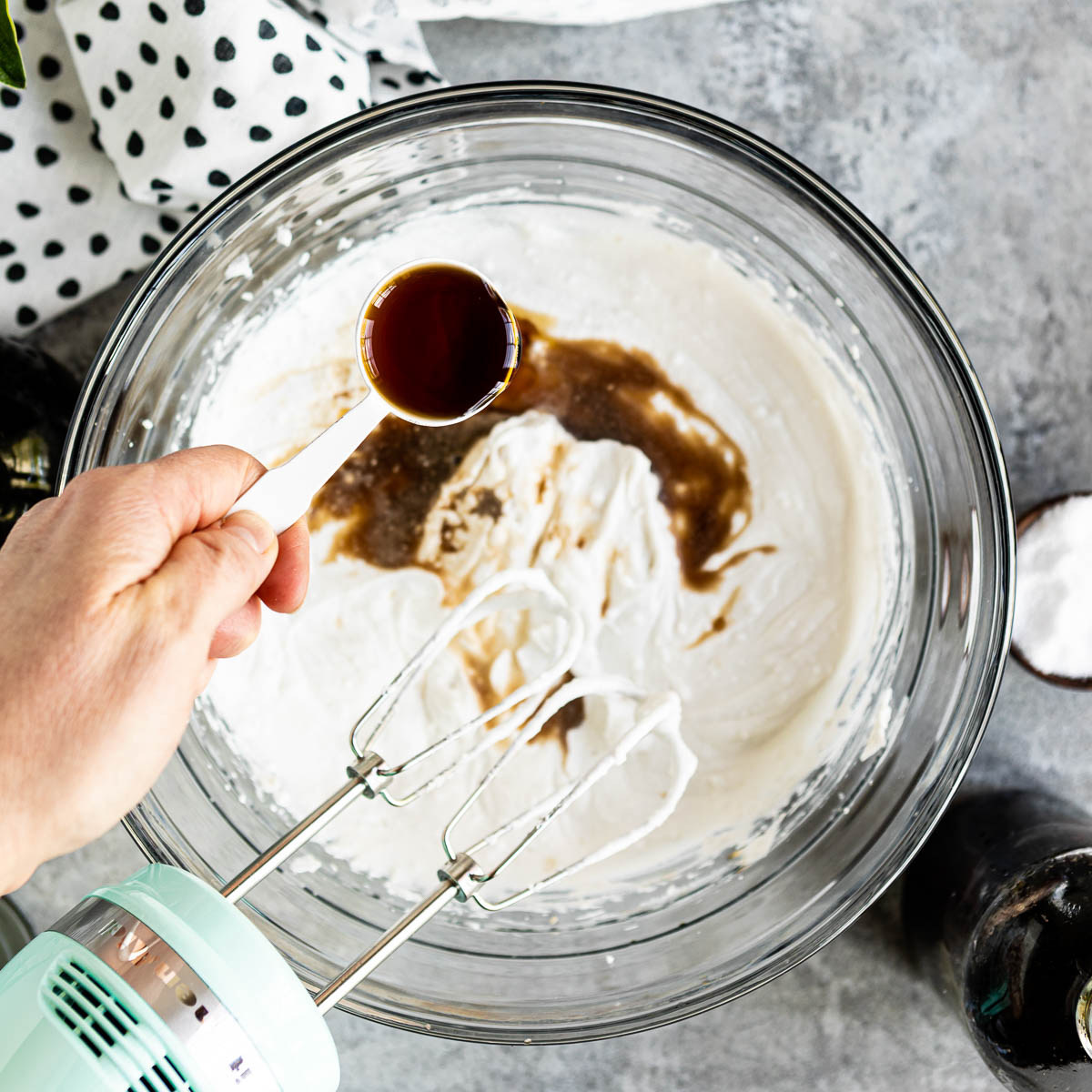 Adding remaining ingredients to whipped coconut cream