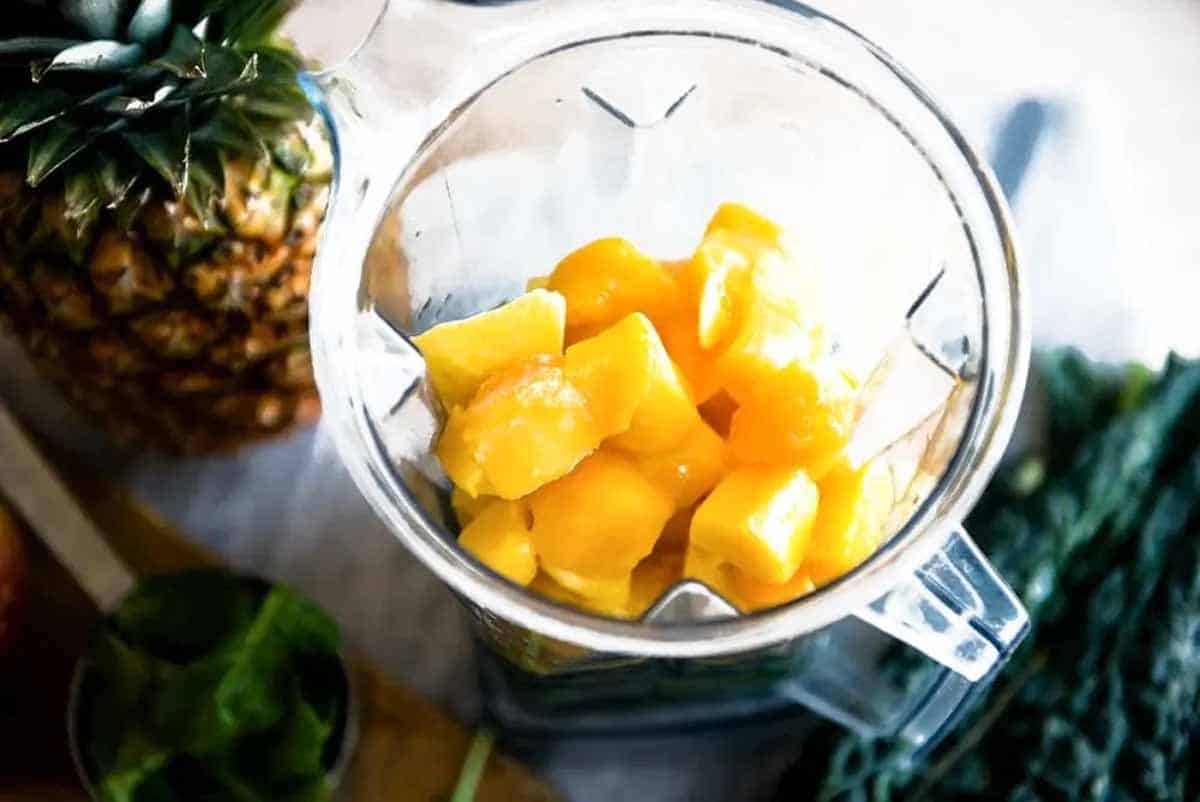 Fresh mango in a blender