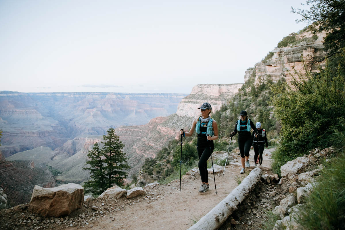 Women with trekking poles on Grand Canyon Rim to Rim hike.