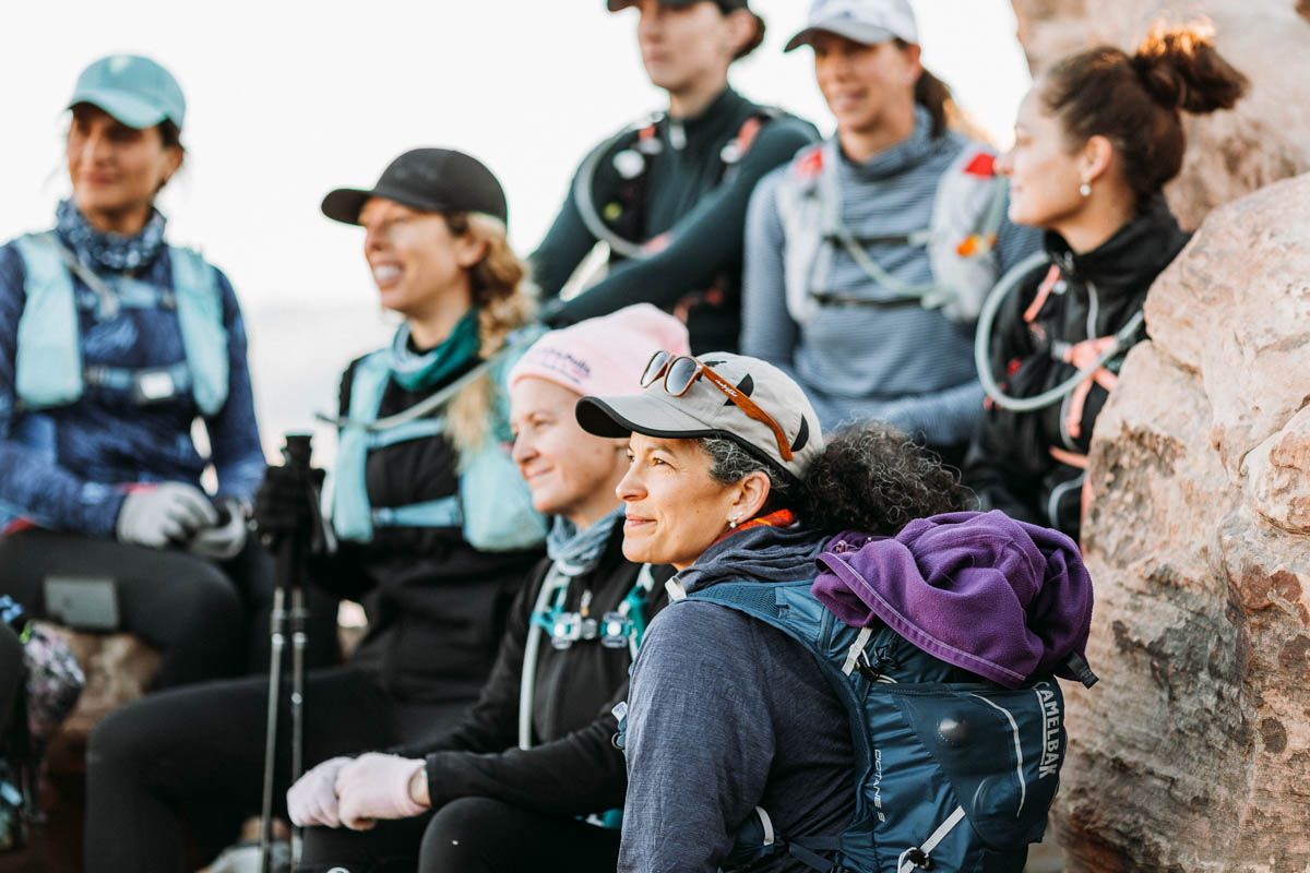 Women resting with hiking backpacks on Grand Canyon RIm to Rim.