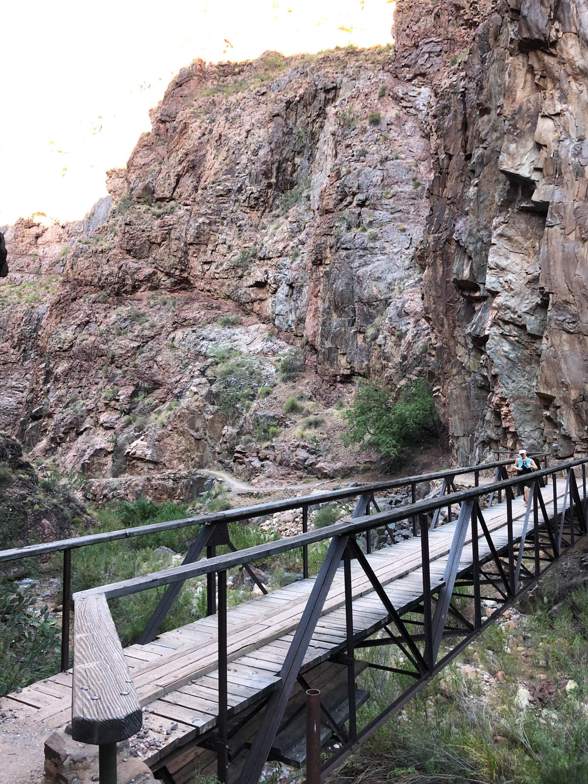 Runner on bridge along Grand Canyon Rim to Rim.