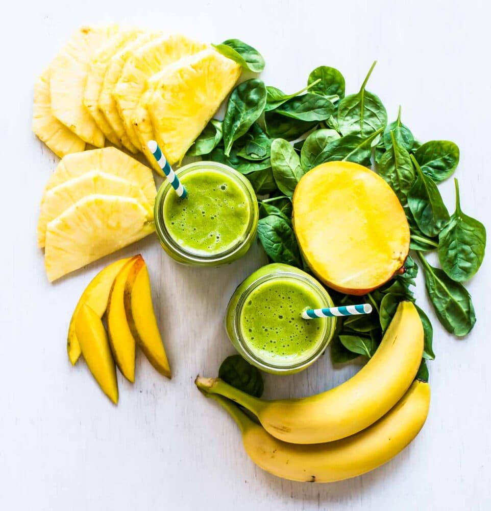 Green smoothie with spinach, mango, pineapple and banana.