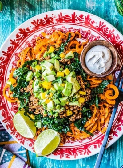 vegetarian taco salad on a brightly decorate plate.