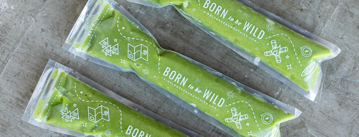 3 green smoothie pops in plastic sleeves that say born to be wild.