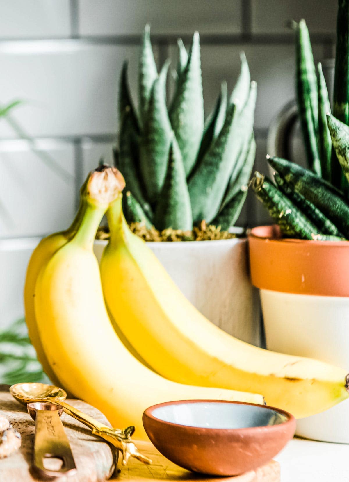 fresh bananas on a table ready for freezing.