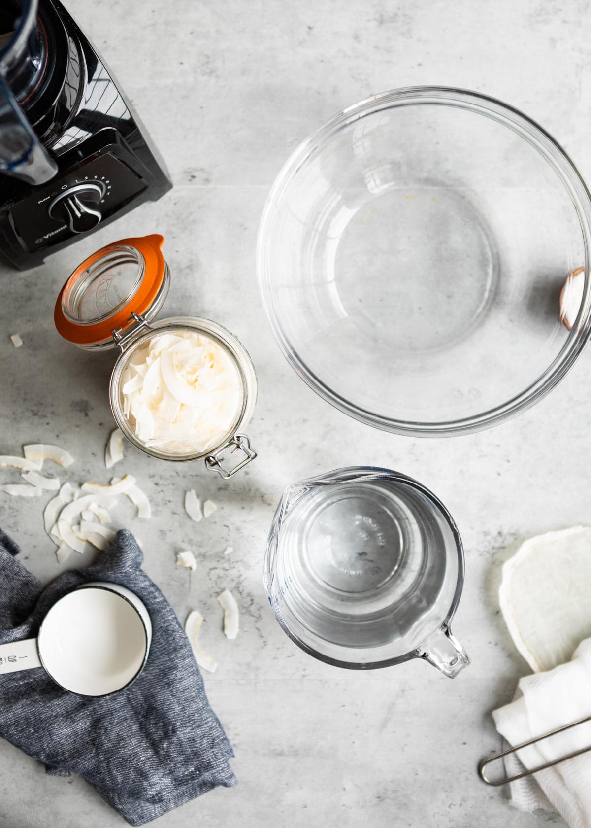 tools + ingredients in glass containers for coconut milk.