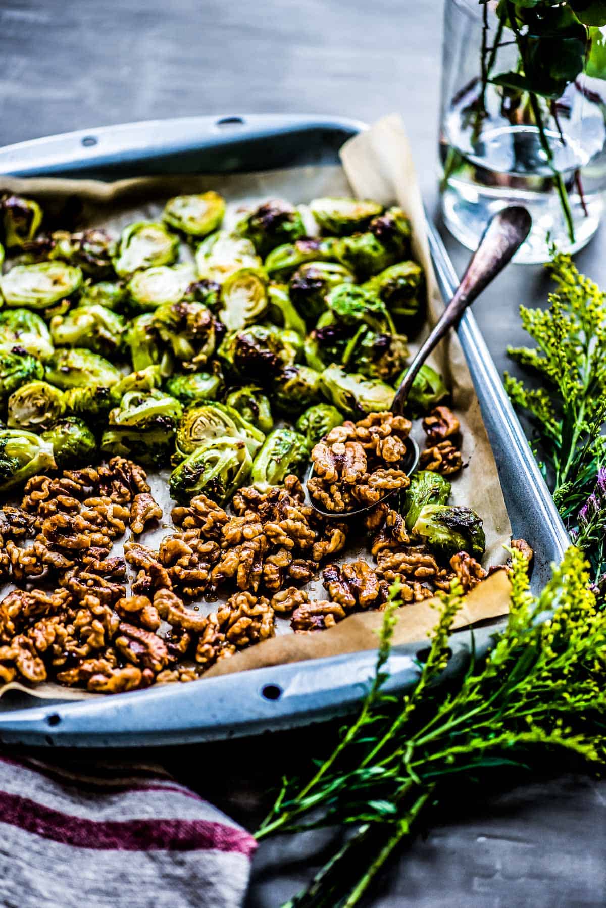 sheet pan of Brussels sprouts and walnuts.