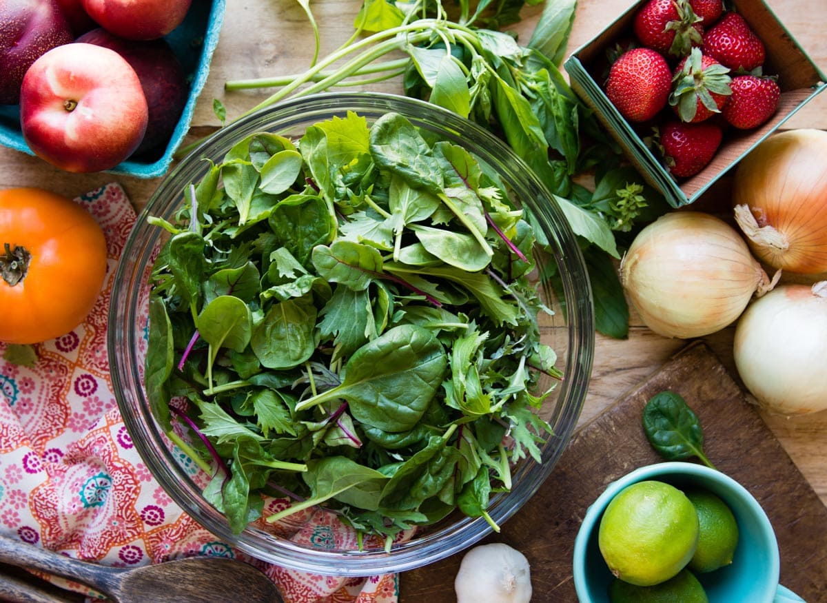 vibrant array of green vegetables for a plant based meal in a glass bowl.