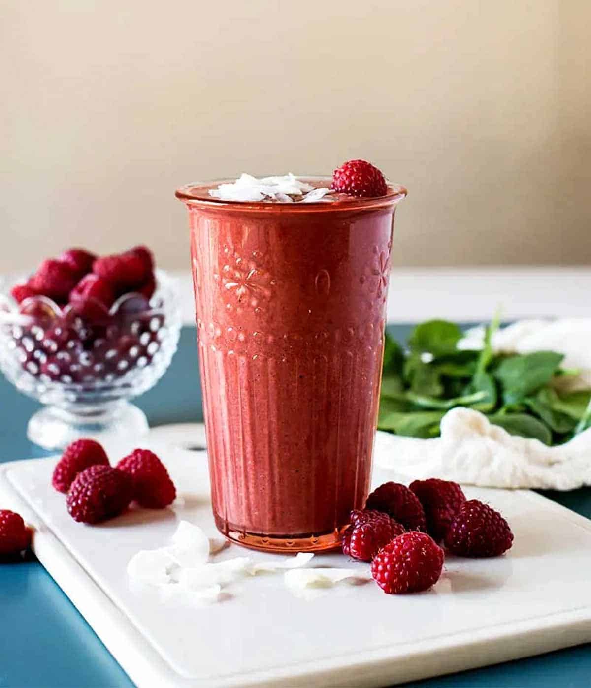 Raspberry smoothie topped with coconut