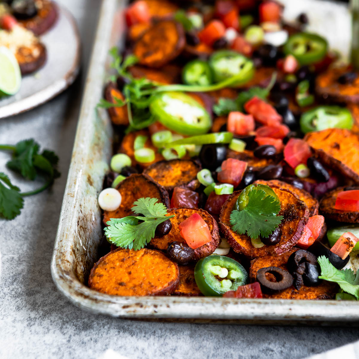 sweet potatoes with a variety of veggie toppings