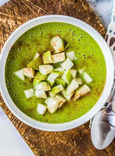 Healthy green smoothie bowl with toppings