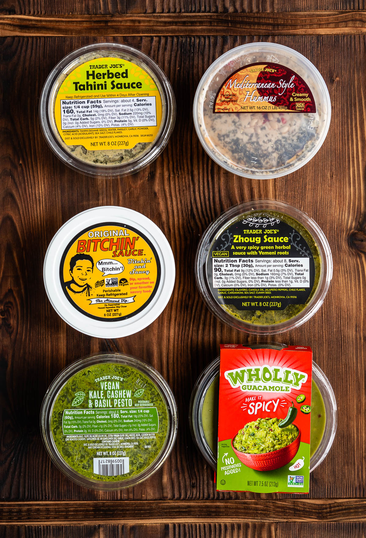 6 vegan dip options including herbed tahini, hummus, bitchin' sauce, zhoug sauce, pesto and guacamole.