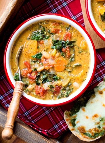 Vibrant, loaded vegan minestrone soup in a bowl